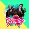 Conmigo (feat. Manny Cruz) - Single album lyrics, reviews, download