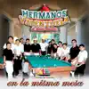 En La Misma Mesa album lyrics, reviews, download